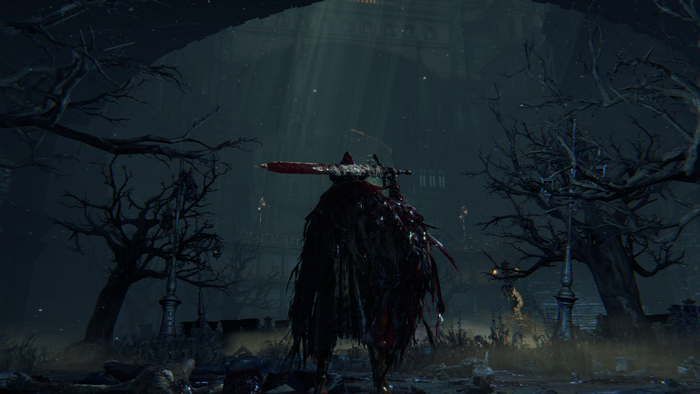 Character with bloody sword in Bloodborne