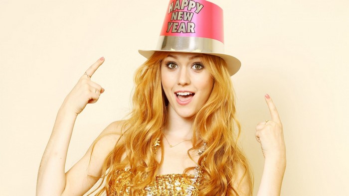 Katherine McNamara wearing a Happy New Year hat