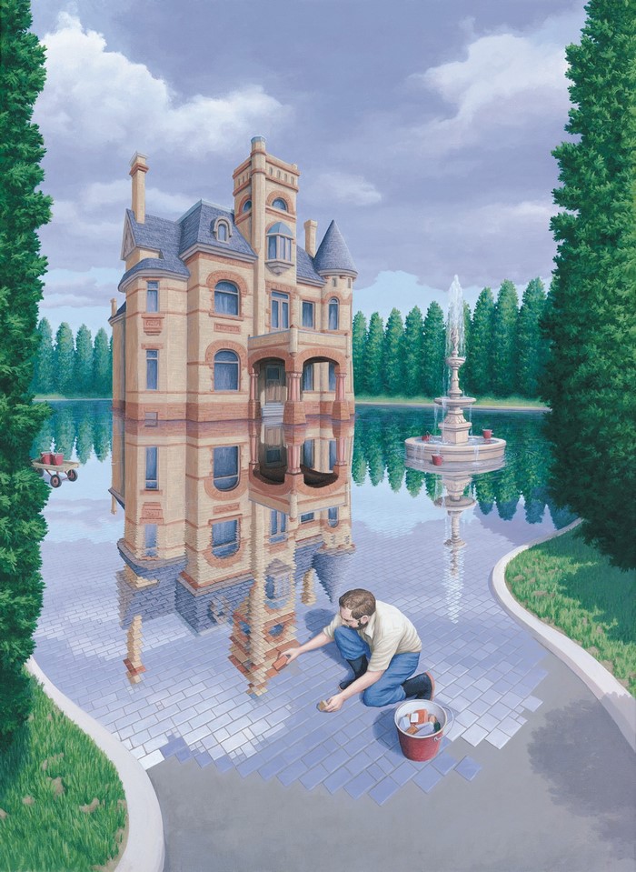 Man tiling a reflective pathway in front of a mansion on water