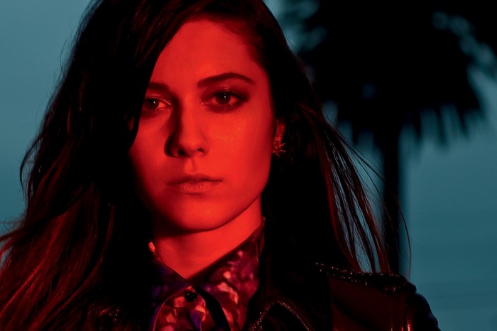 Mary Elizabeth Winstead in red light with palm trees