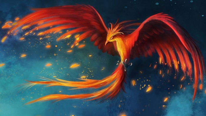 Phoenix bird with fiery wings in dark blue sky