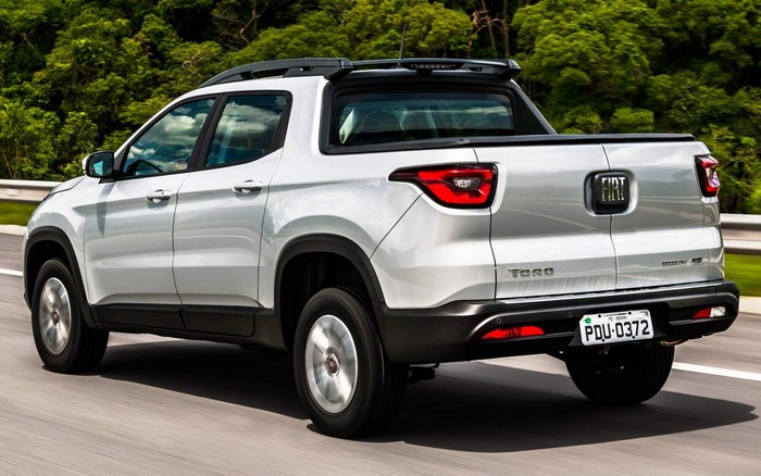 Fiat Toro pickup truck driving on a road