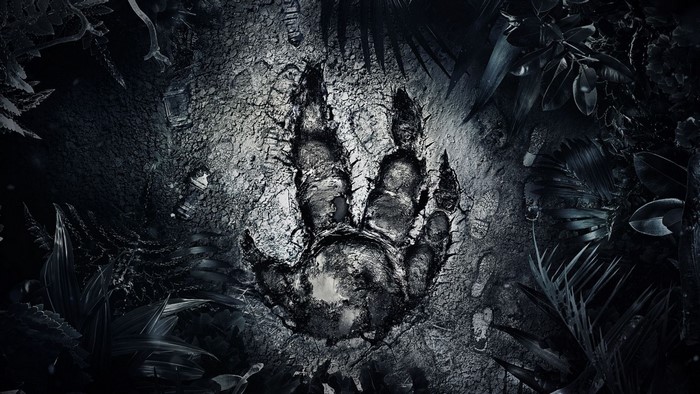 Dinosaur footprint in dark jungle