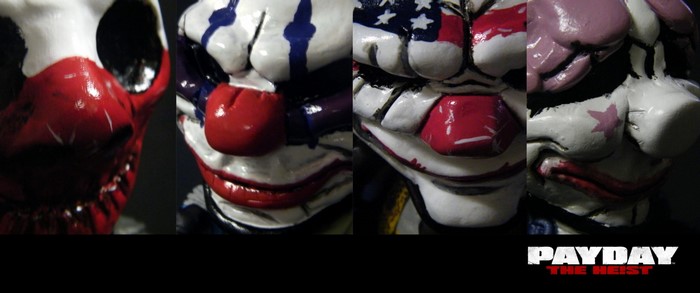 Four Payday The Heist masks in a row