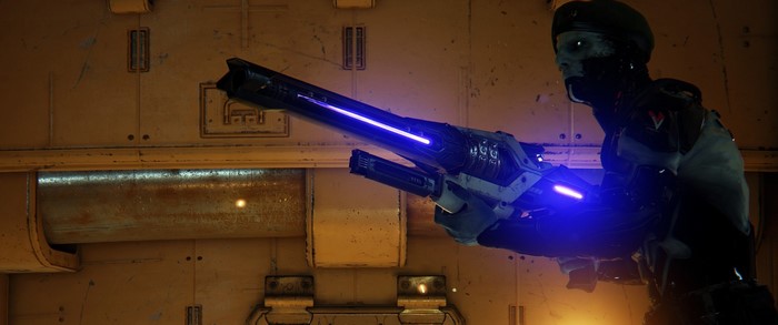 Unreal Tournament character with futuristic weapon
