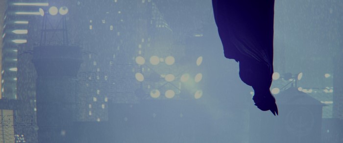 Batman in a rainy city at night