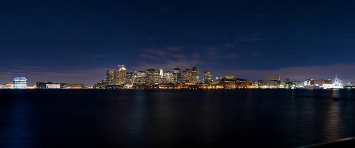 Boston cityscape at night across the water