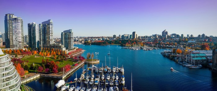 Vancouver cityscape with marina and autumn foliage