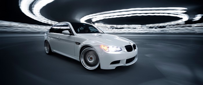 White BMW M3 Sedan in a Tunnel with Light Streaks