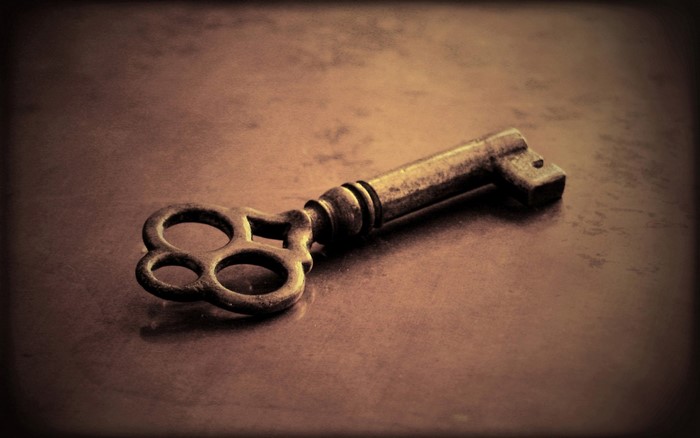Antique Skeleton Key on Textured Surface