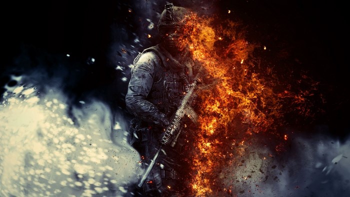 Soldier engulfed in flames with smoke and debris