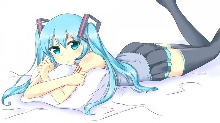 Hatsune Miku from Vocaloid lying on a bed