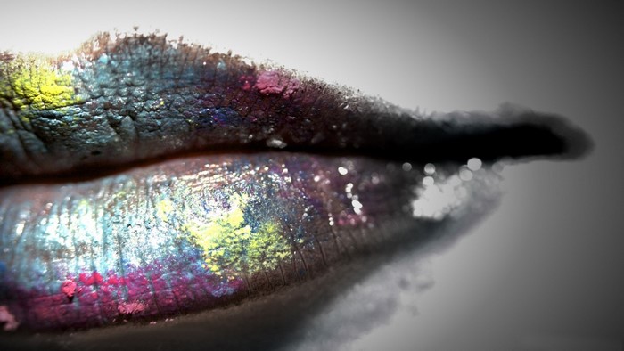Close up macro photography of lips with colorful glitter makeup