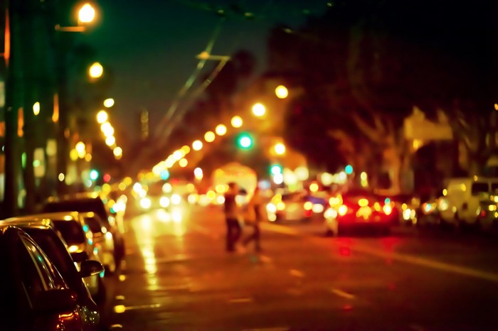 City street at night with bokeh lights