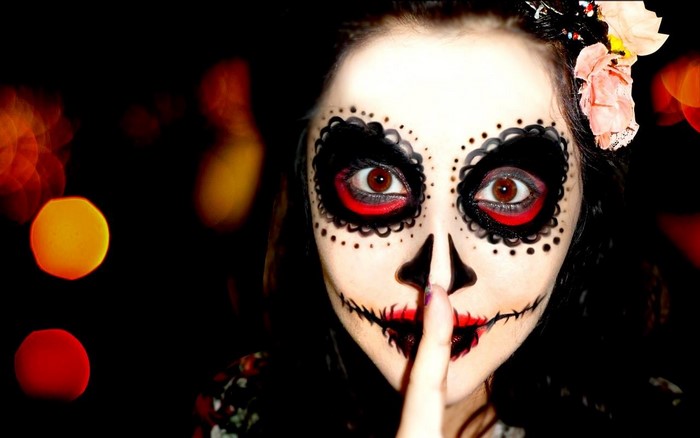 Woman with Sugar Skull makeup and flower crown