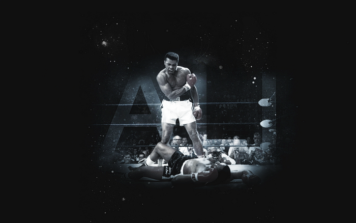 Muhammad Ali standing over a fallen opponent in a boxing ring