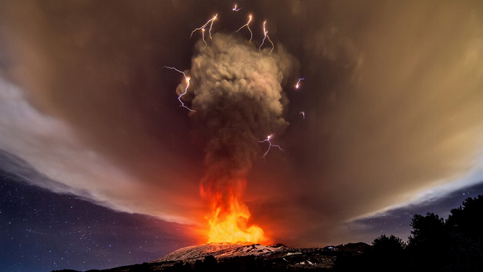 Volcanic eruption with lightning and lava