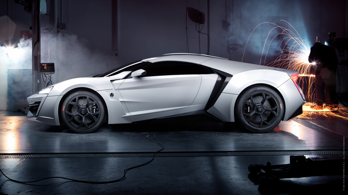 Lykan Hypersport car in a workshop with welding sparks