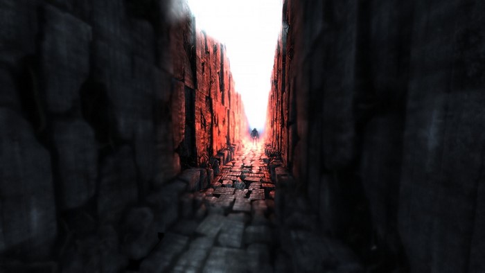 A lone figure walks down a stone path in Metro 2033