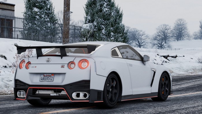 White Nissan GT-R NISMO in a Snowy Environment