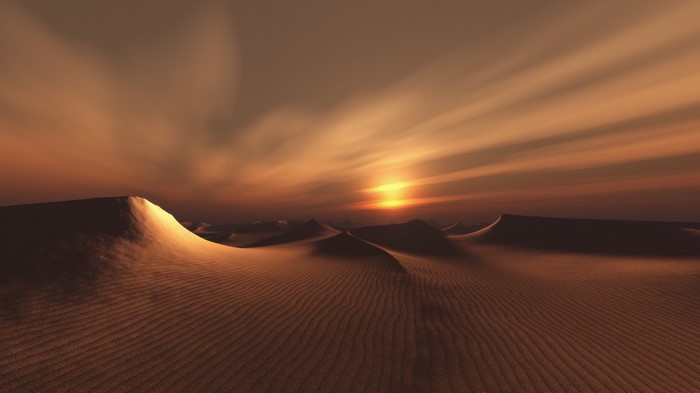 Sunset Over Expansive Desert Sand Dunes