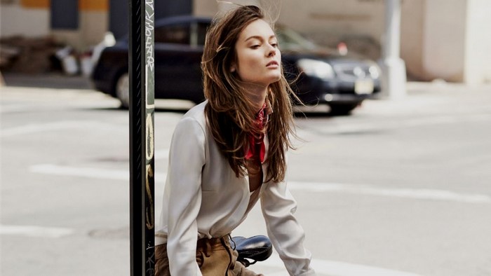 Monika Jagaciak wearing a white shirt and red bandana