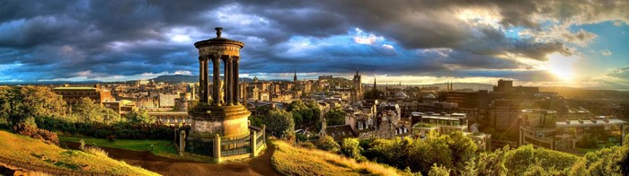 Edinburgh cityscape with Dugald Stewart Monument at sunset
