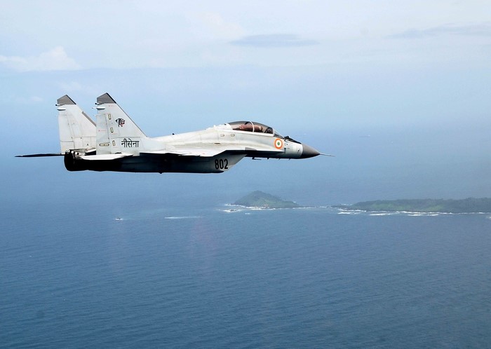 Indian Navy MiG-29K fighter jet flying over the ocean
