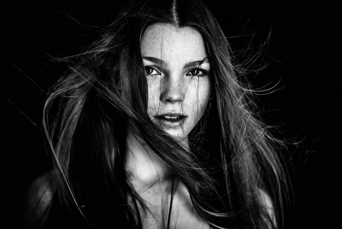 Monochrome portrait of a woman with long hair