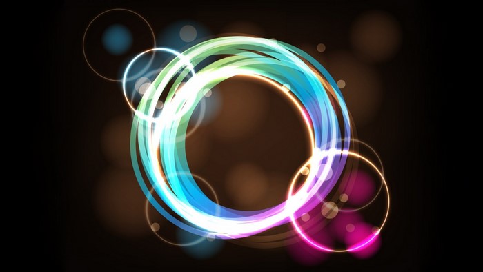 Abstract colorful neon circles on brown background