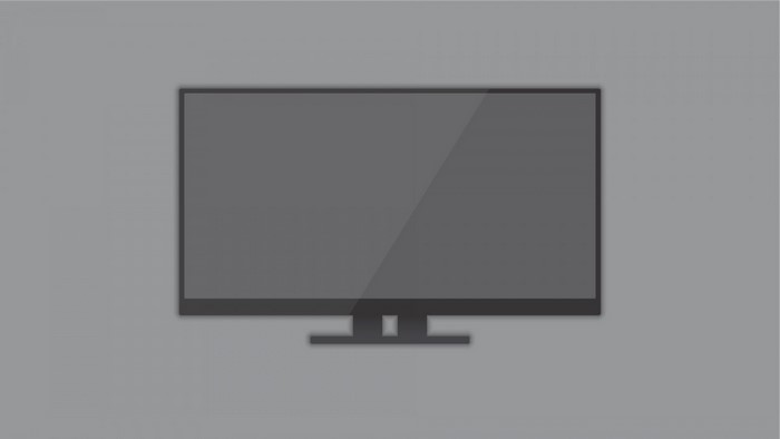 A flat-screen computer monitor on a gray background