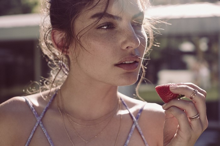 Alyssa Elaine Miller eating a strawberry