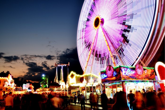 Long exposure of a Ferris wheel at a night fair