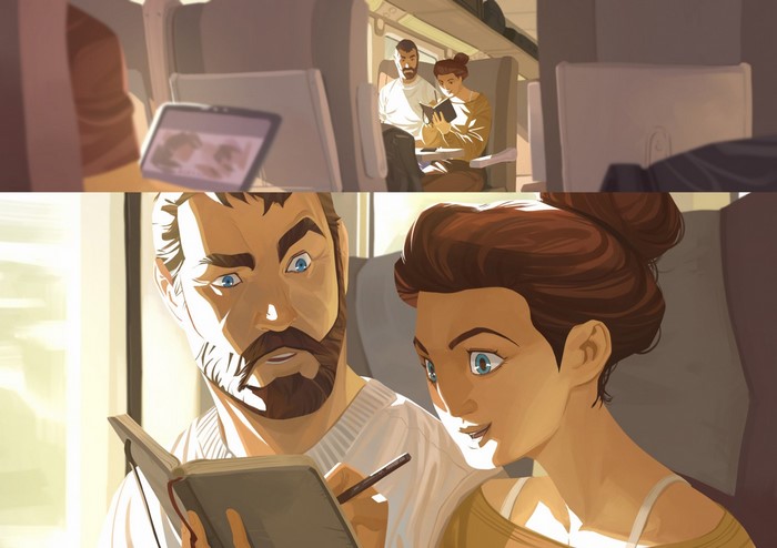 Couple on a train looking at a notebook