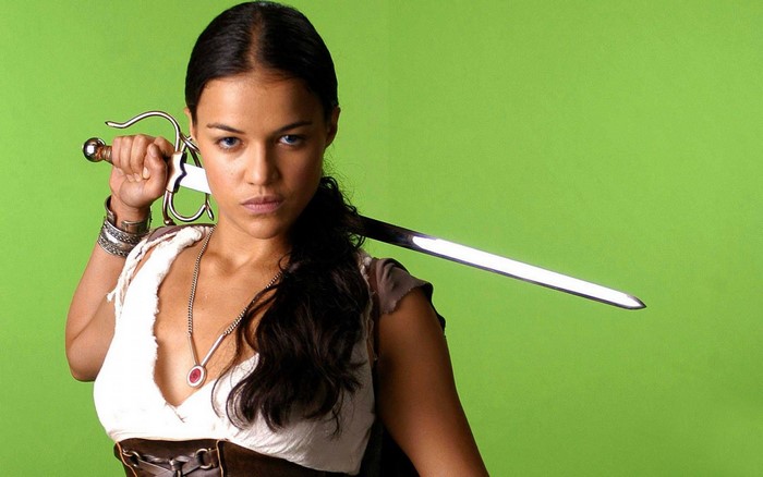 Michelle Rodriguez holding a sword