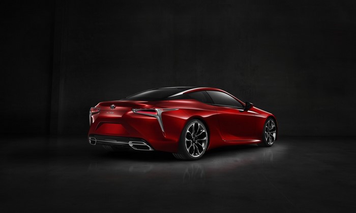Red Lexus LC 500 Coupe on a dark background