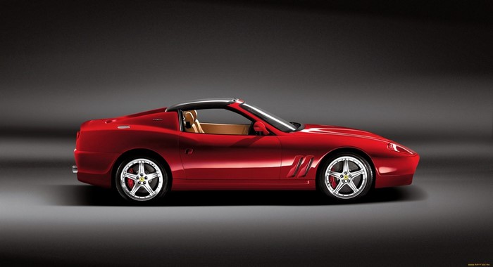 Red Ferrari convertible sports car