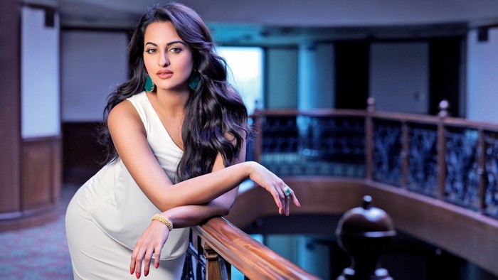 Sonakshi Sinha posing in a white dress