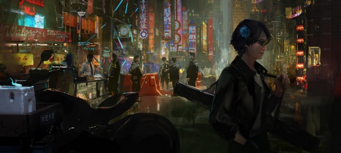 Woman in a futuristic city at night
