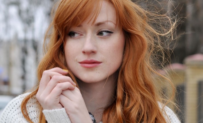 Portrait of a Redhead Woman with Long Hair