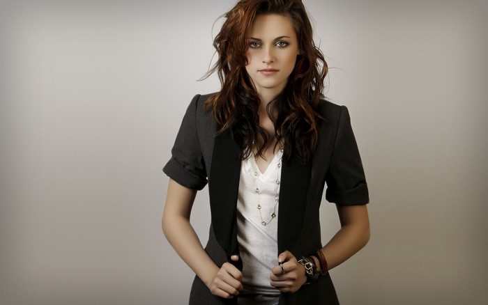 Kristen Stewart in a black blazer and white shirt