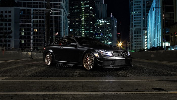 Black Mercedes-Benz C63 AMG Coupe at Night