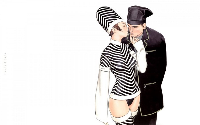 Woman in striped outfit and man in formal wear