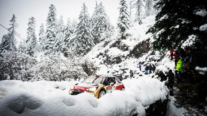 Citroen DS3 WRC car driving through snow