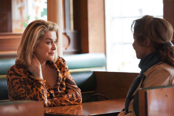Catherine Deneuve in a restaurant