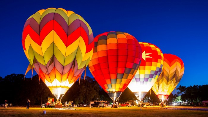 Hot air balloons at night