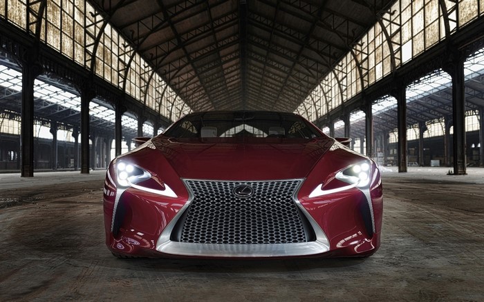 Red Lexus LC 500 parked in an industrial building