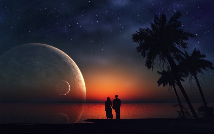 Couple watching a large planet and moon at sunset