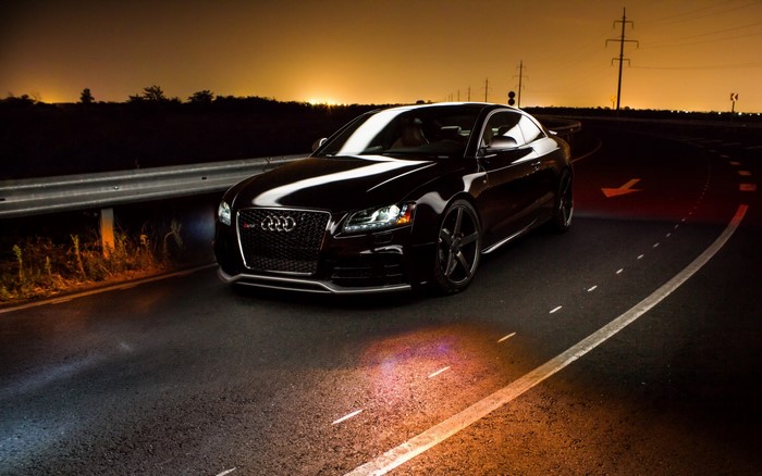Black Audi RS 5 Coupe on a Road at Dusk