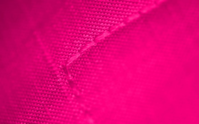 Close-up of pink fabric with stitching